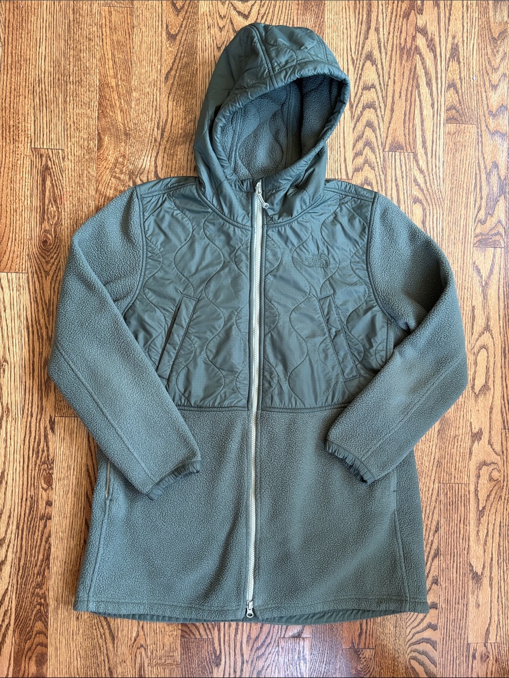 The North Face women’s green fleece hooded Royal Arch parka, size L.